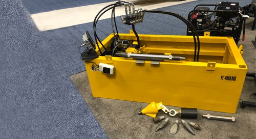 The PD-6 was designed for use in difficult soil conditions where a pipe or cable is to be installed under a road or in an area that cannot be dug. The PD-6 can install pipes by either directional thrust boring or pipe bursting. These machines are excellent in areas where space is limited.

The PD-6 will operate from a pit only 56 inches long and has a thrust force of 84,822 lbs@ 3,000 psi. The maximum push rate of PD-6 is 7 feet/minute and it can install up to 8-inch ID pipe in most compressible soils. The PD-6 is great for the most difficult piping areas. This piece of equipment is also compact to allow you to fit in difficult spaces.